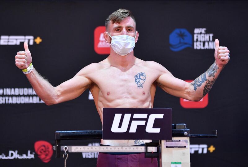 ABU DHABI, UNITED ARAB EMIRATES - JULY 14: Tim Elliott poses on the scale during the UFC Fight Night weigh-in inside Flash Forum on UFC Fight Island on July 14, 2020 in Yas Island, Abu Dhabi, United Arab Emirates. (Photo by Jeff Bottari/Zuffa LLC via Getty Images)