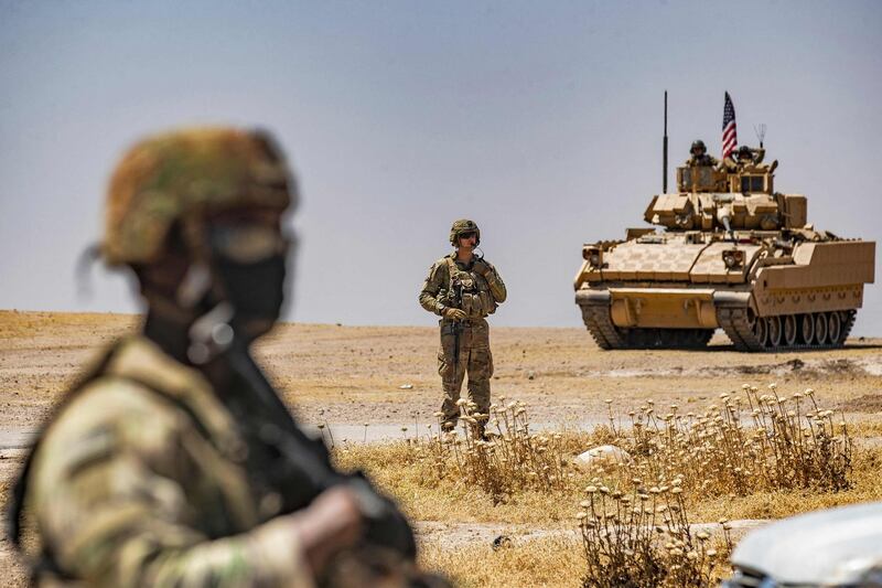 A US patrol at the Rmelan oilfield. Rmelan is a major centre of oil production in Syria, with the first exploratory work taking place in 1934. AFP