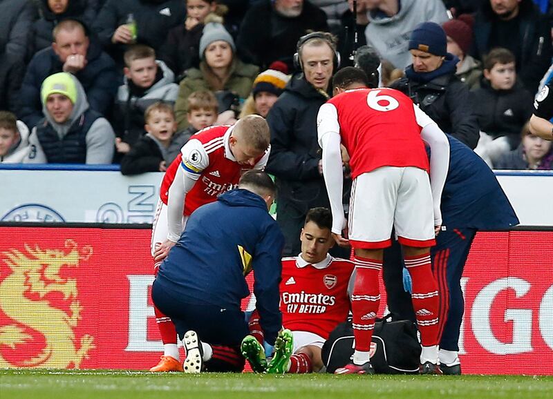 Arsenal's Gabriel Martinelli receives medical attention after sustaining an injury. Reuters