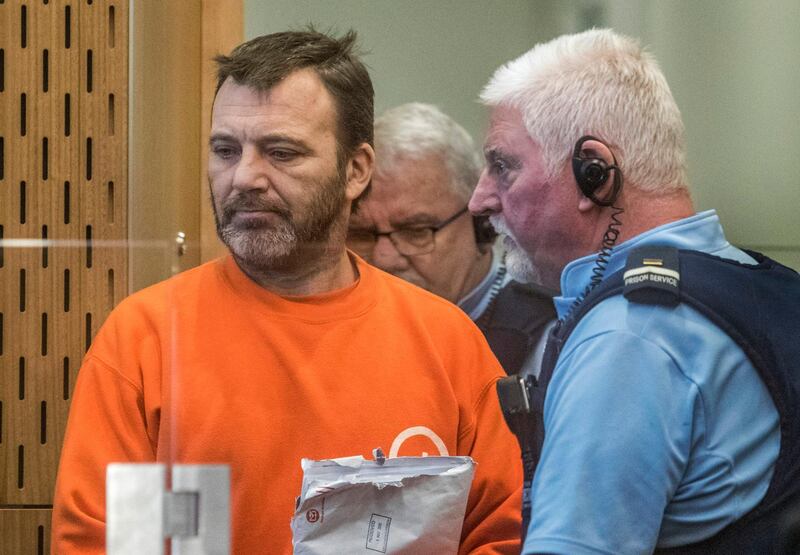 Philip Neville Arps, left, appears for sentencing in the Christchurch District Court, in Christchurch, New Zealand, Tuesday, June 18, 2019.  The Christchurch businessman who shared a video of worshippers being slaughtered at a New Zealand mosque has been sentenced to 21 months in prison. (John Kirk-Anderson/Pool via AP)