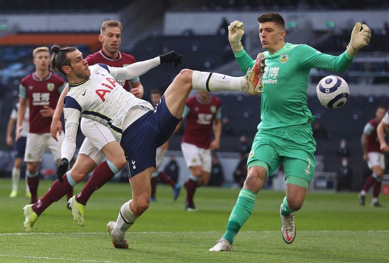 Bale of Spurs goes for the ball with Burnley goalkeeper Nick Pope. Getty