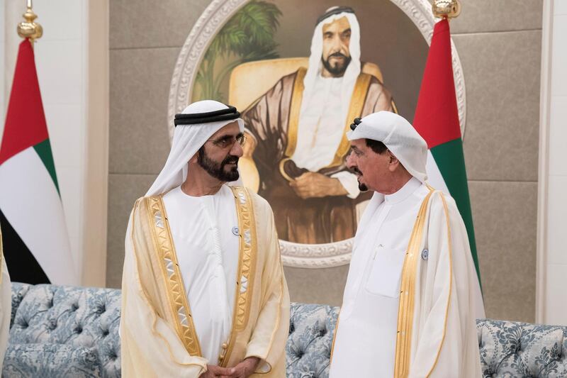 ABU DHABI, UNITED ARAB EMIRATES - August 21, 2018: HH Sheikh Mohamed bin Rashid Al Maktoum, Vice-President, Prime Minister of the UAE, Ruler of Dubai and Minister of Defence (L) and HH Sheikh Humaid bin Rashid Al Nuaimi, UAE Supreme Council Member and Ruler of Ajman (R) attend an Eid Al Adha reception at Mushrif Palace.

( Mohamed Al Hammadi / Crown Prince Court - Abu Dhabi )
---