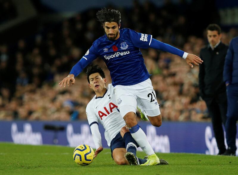 Soccer Football - Premier League - Everton v Tottenham Hotspur - Goodison Park, Liverpool, Britain - November 3, 2019  Everton's Andre Gomes is fouled by Tottenham Hotspur's Son Heung-min   REUTERS/Andrew Yates  EDITORIAL USE ONLY. No use with unauthorized audio, video, data, fixture lists, club/league logos or "live" services. Online in-match use limited to 75 images, no video emulation. No use in betting, games or single club/league/player publications.  Please contact your account representative for further details.