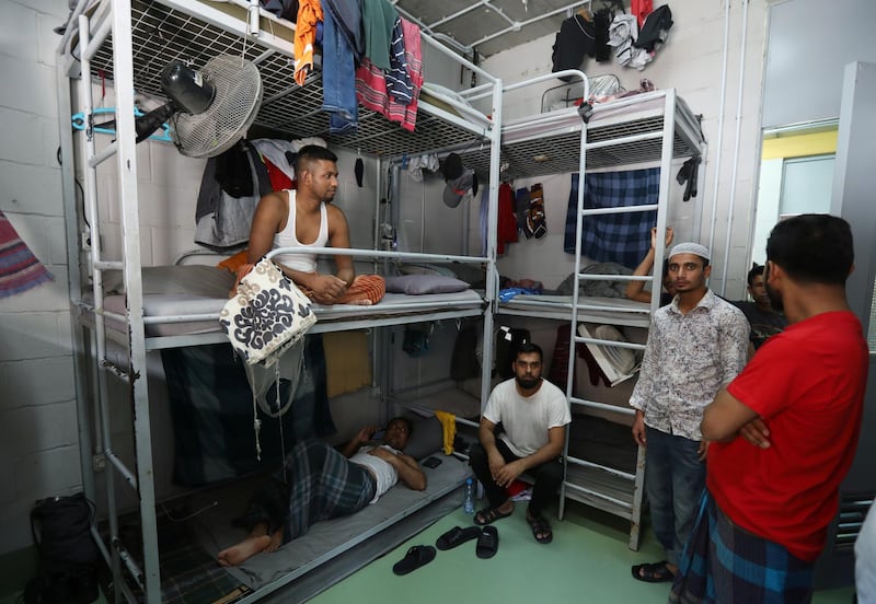 Migrant workers from Bangladesh, working for waste management company RAMCO, gather inside their dormitory at a company facility in Biakout, near Beirut, Lebanon, May 20, 2020. Picture taken May 20, 2020. REUTERS/Mohamed Azakir