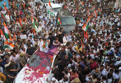 epa07486886 Indian National Congress party member Priyanka Gandhi (C-R), who is Congress general secretary and in charge of eastern Uttar Pradesh along with the Congress Party Ghaziabad candidate Dolly Sharma (C-L) take part in a road show during election campaign in Ghaziabad, Uttar Pradesh, 05 April 2019. India is preparing for its general elections which will be held in seven rounds from 11 April 2019. The results will be announced on 23 May.  EPA/RAJAT GUPTA