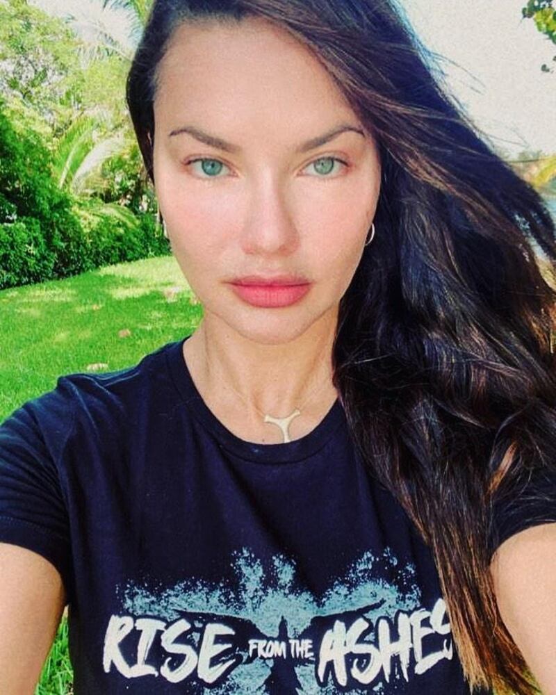 Brazilian model Adriana Lima wearing Zuhair Murad's Rise from the Ashes T-shirt. Instagram / adrianalima