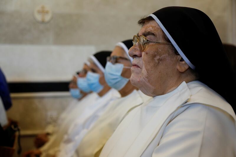Nuns attend mass. Reuters