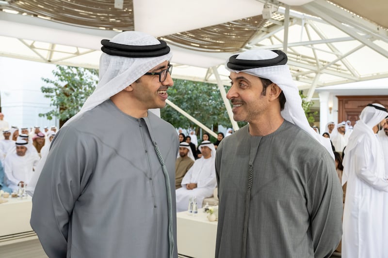 Sheikh Abdullah bin Zayed, Minister of Foreign Affairs and International Co-operation, left, speaks with Sheikh Hazza bin Zayed, vice chairman of the Abu Dhabi Executive Council