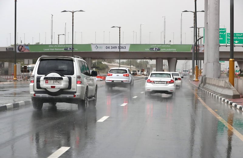 DUBAI, UNITED ARAB EMIRATES , March 22 – 2020 :- Traffic during the rain on King Salman Bin Abdulaziz Al Saud street in Dubai. (Pawan Singh / The National) For News/Online/Instagram. 