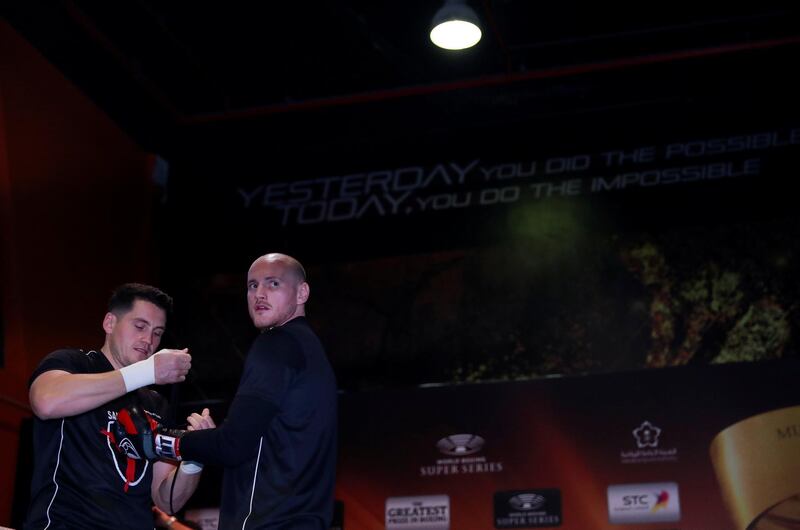Groves with trainer Shane McGuigan. Action Images via Reuters