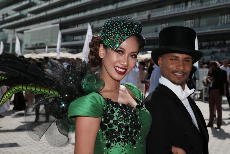 Race-goers pose before kick-off. REUTERS