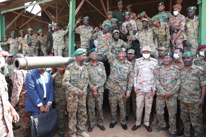 Gen Abdul Farrah Al Burhan visits the Al Shagara military complex on the outskirts of Khartoum, where Tuesday’s coup plotters are known to have served. Photo: Sudanese Armed Forces Media Office