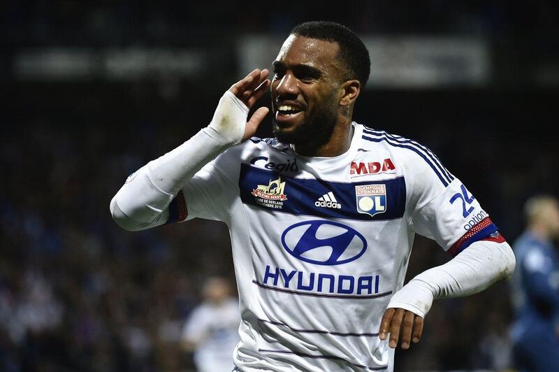 Lyon's Alexandre Lacazette celebrates after scoring against Saint-Etienne on Sunday in Ligue 1. Jeff Pachoud / AFP / November 8, 2015 