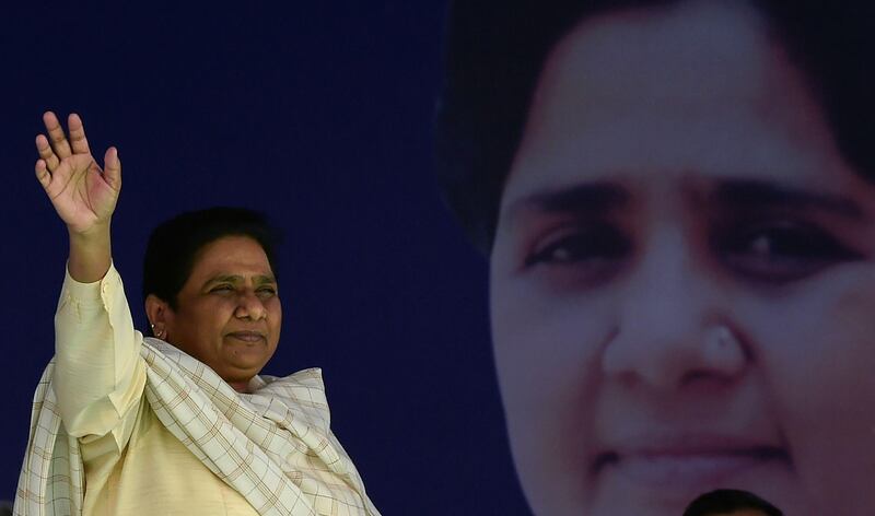 (FILES) In this file photo taken on February 7, 2017 India's Bahujan Samaj Party (BSP) leader Mayawati waves to the crowd upon her arrival at an election rally in Ghaziabad. Two bitter rival political parties formed an unlikely alliance January 12, 2019 to fight Prime Minister Narendra Modi's ruling Hindu nationalist party in a looming general election. The Samajwadi Party (SP) and Bahujan Samaj Party (BSP) -- key regional parties in the northern state of Uttar Pradesh -- said they would set aside their differences to jointly fight the election in the bedrock state for Modi.
 / AFP / MONEY SHARMA
