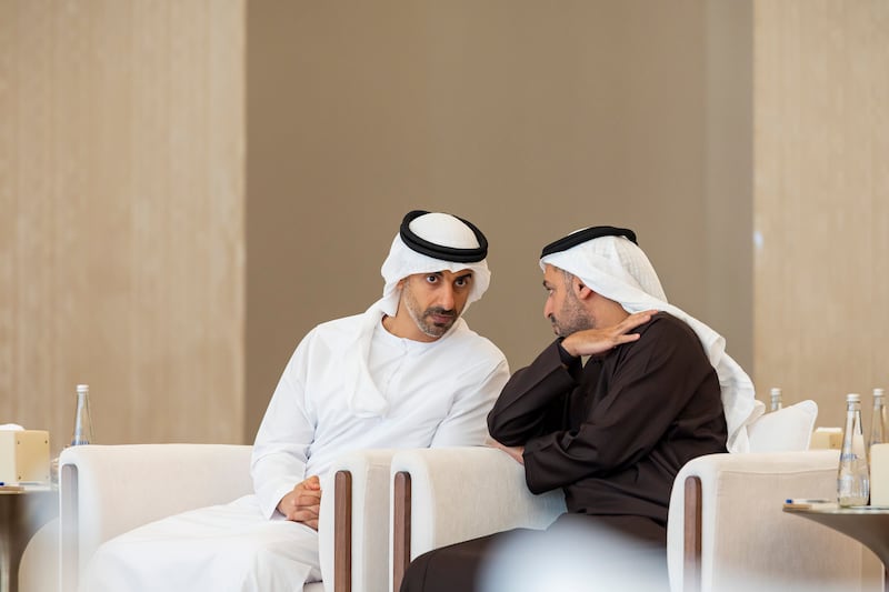 Sheikh Hamdan bin Mohamed and Sheikh Mohamed bin Hamad, private affairs adviser in the Presidential Court, at the Presidential Airport. Photo:  Ryan Carter / UAE Presidential Court