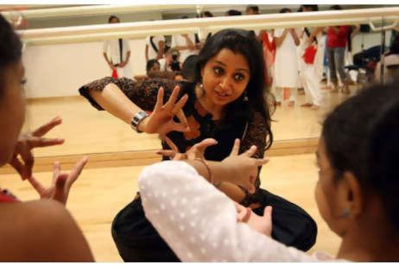 Pali Chandra instructs young dancers in the finer points of the ancient art of kathak during rehearsals for the forthcoming Dancing Divas 2010 - Five Elements, to be held in Dubai on June 12.