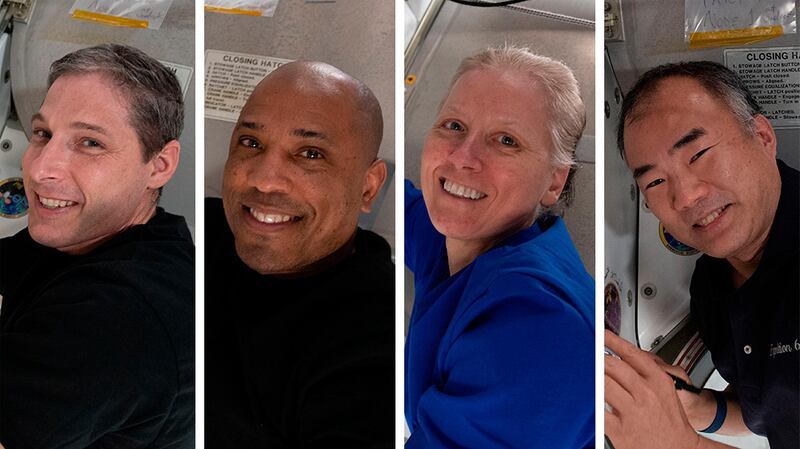 This photo combination provided by Nasa shows from left,  Expedition 64 Flight Engineers and SpaceX Crew-1 members Michael Hopkins, Victor Glover, Shannon Walker and Soichi Noguchi. AP Photo