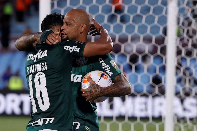 Palmeiras' Felipe Melo celebrates with his teammate Danilo Barbosa. EPA