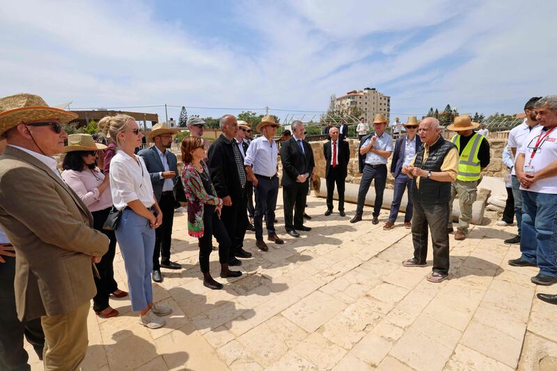 A delegation of EU diplomats visit the archaeological site.