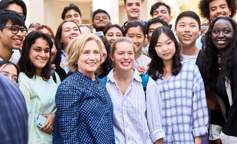 Former US secretary of state Hillary Clinton with New York University Abu Dhabi students. Photo: NYUAD