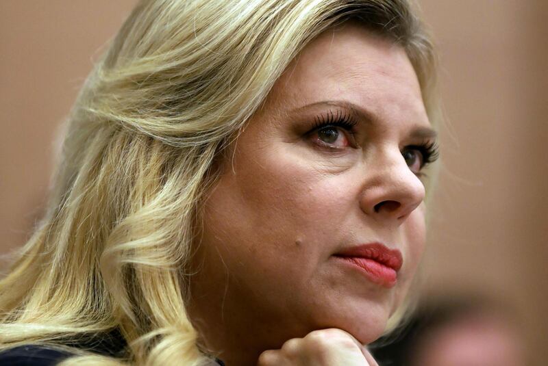 (FILES) In this file photo taken on January 31, 2017, Sara Netanyahu, the wife of Israeli Prime Minister Benjamin Netanyahu attends an event at the Knesset (Israel's parliament) in Jerusalem. Sara Netanyahu was charged with fraud and breach of trust on June 21, 2018 after a long police probe into allegations she falsified household expenses, the justice ministry said. / AFP / GALI TIBBON AND GALI TIBBON AND GALI TIBBON
