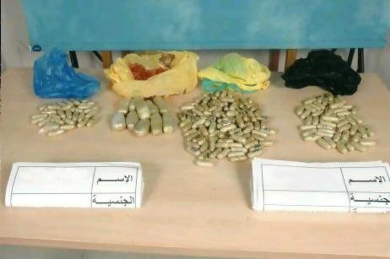 The gang used lorry drivers to smuggle drug capsules out of the UAE.