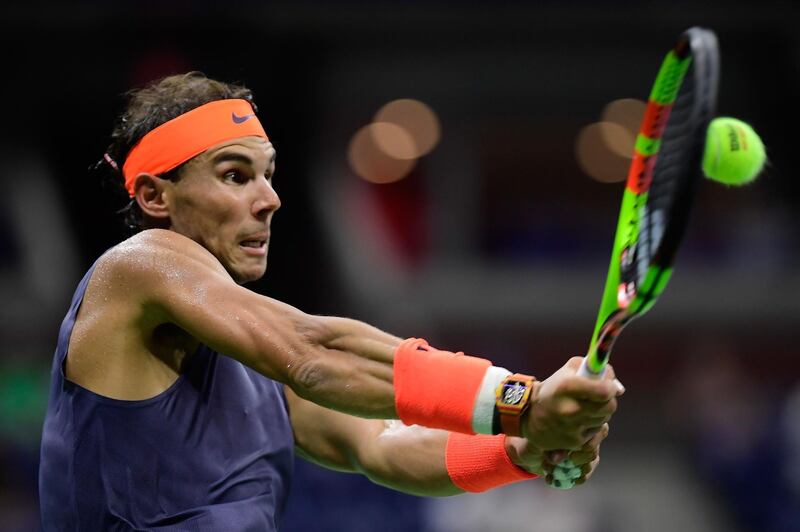 Nadal returns the ball. AFP
