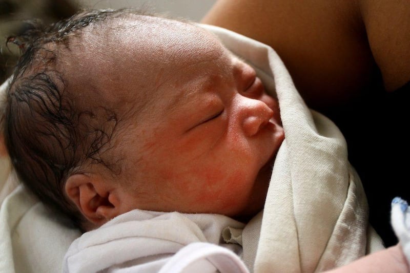 Baby Beatriz Joy is born at a makeshift medical centre in the storm-damaged central Philippine city of Tacloban. AFP Photo / Jason Gutierrez

