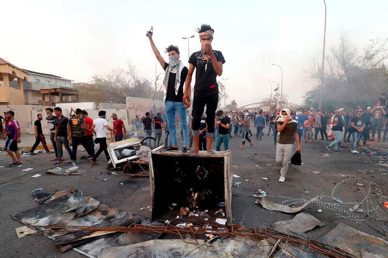 Iraqi protesters demonstrate against the government and the lack of basic services in Basra. The country has been gripped by unrest over power outages, unemployment, state mismanagement and a lack of clean water. AFP