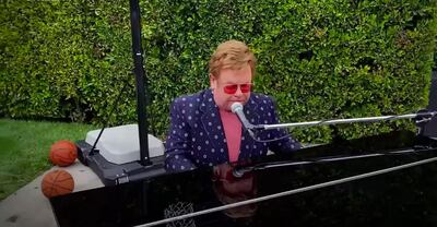 Elton John performed al fresco, seemingly on a basketball court. YouTube 