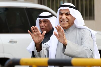 Kuwait's former National Assembly speaker Ahmad Al Saadoun waves after registering his candidacy for the upcoming parliamentary elections in Kuwait City. AFP