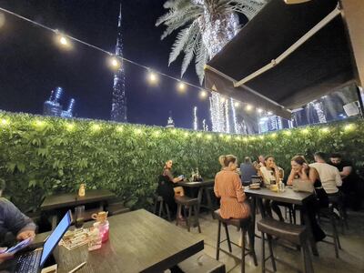 Distillery has an outdoor terrace with limited seating and views of the Burj Khalifa. Courtesy Distillery