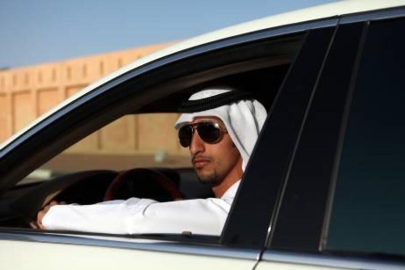 February 15, 2011 / Abu Dhabi / (Rich-Joseph Facun / The National) A portrait of Matar al Mansouri (CQ), an Emirati, in his Mercedes photographed, Tuesday, February 15, 2011 in Al Ain. 