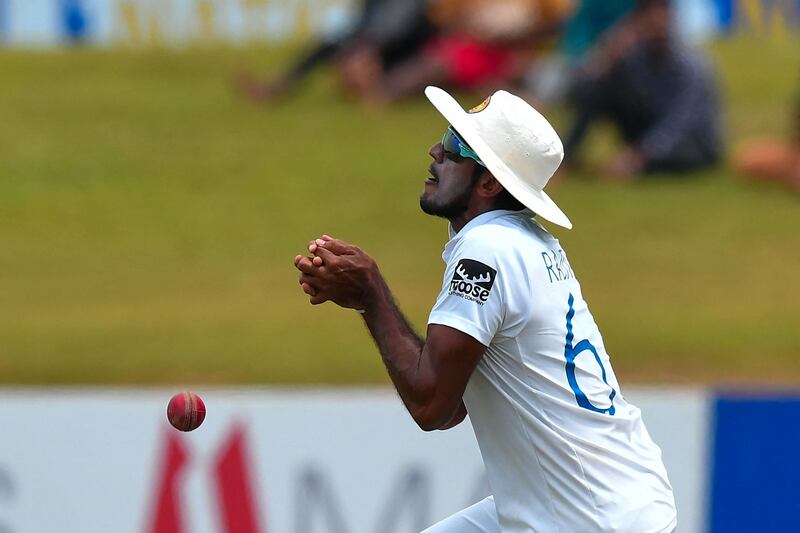 Sri Lanka's Kasun Rajitha drops a catch off Abdullah Shafique. AFP