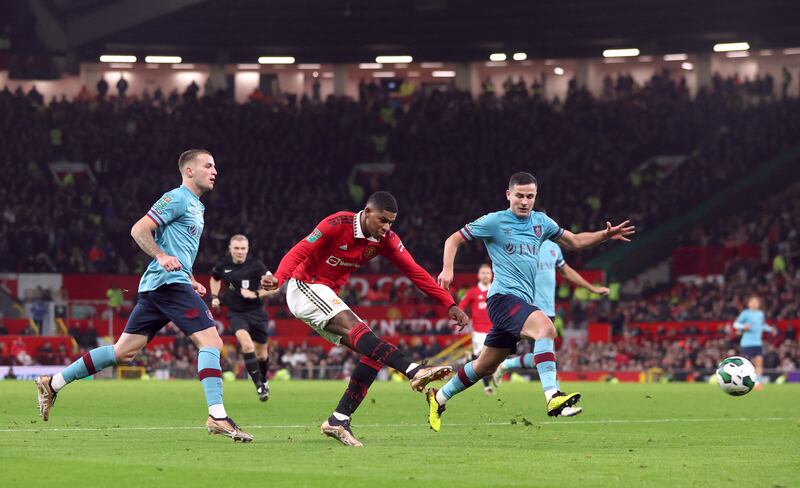 Manchester United's Marcus Rashford scores their second goal. Reuters