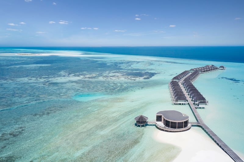 It offers several accommodation options, including sunrise and sunset overwater villas.