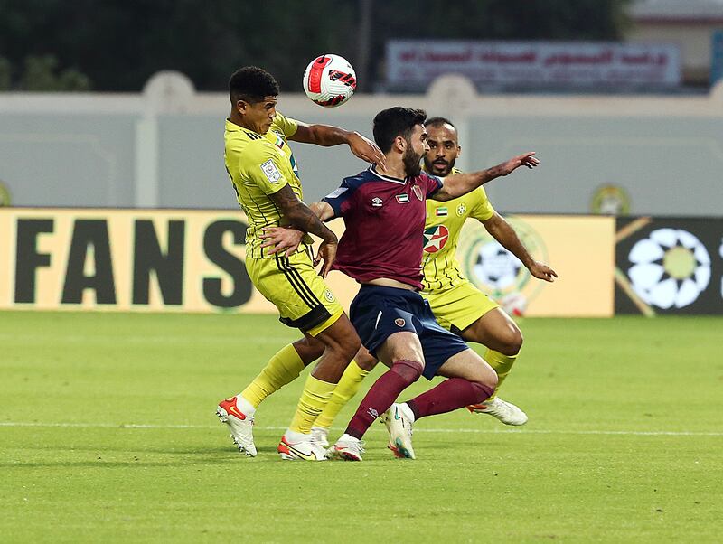 Al Wahda's Omar Khrbin is challenged by Kalba players in the Adnoc Pro League matchweek-11 at Ittihad Kalba stadium on Sunday, December 26, 2021. PLC