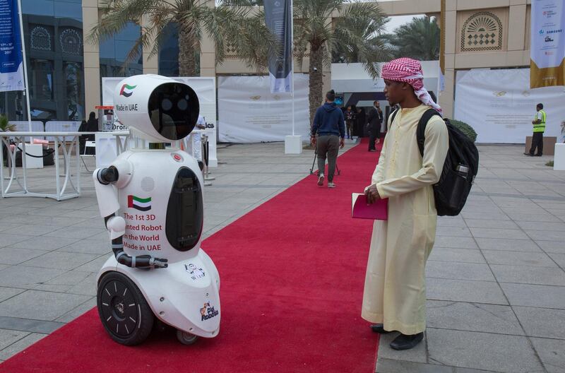 Dubai, U.A.E., February 17, 2017. "Wizo", the first  3D printed robot in the world which is made in UAE is enjoyed by a visitor at the UAE AI Robotics for Good Awards grounds.
Victor Besa for The National
ID: 17594
Reporter:   Amna Shahid-
National *** Local Caption ***  VB_021717_na-internet city-1.jpg