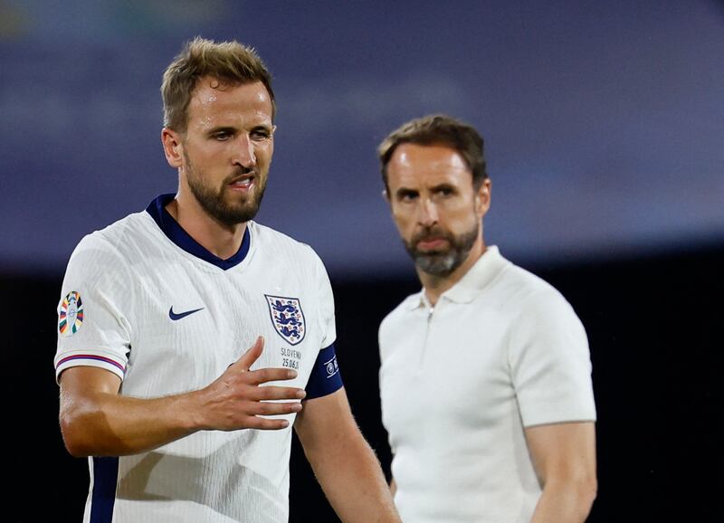 England striker Harry Kane and manager Gareth Southgate during the 0-0 Euro 2024 Group C draw against Slovenia in Cologne on Tuesday, June 25, 2024. Reuters