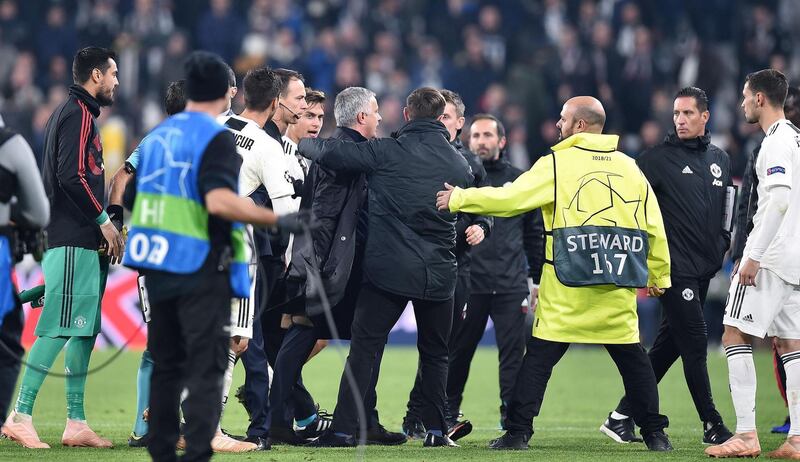 Manchester United manager Jose Mourinho confront Juventus players after the match. EPA