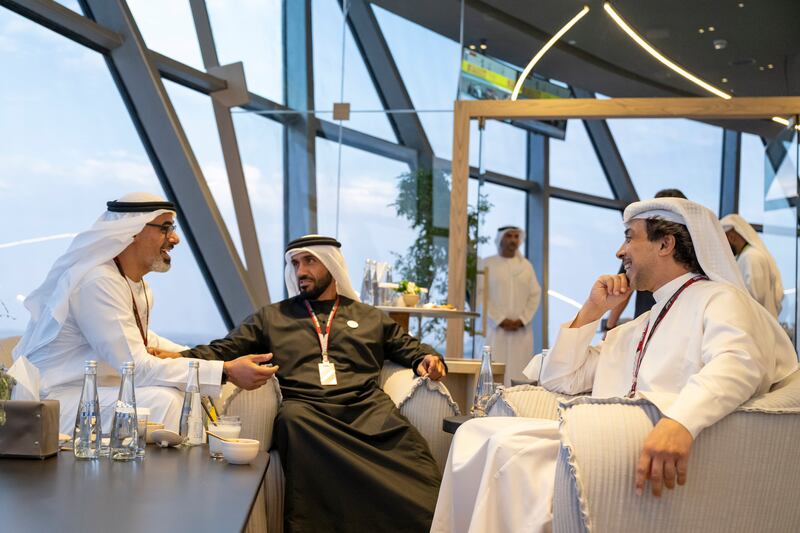 Sheikh Mansour bin Zayed, Sheikh Nahyan bin Zayed, and Sheikh Khaled bin Mohamed in Shams Tower. Photo: Mohamed Al Hammadi / UAE Presidential Court