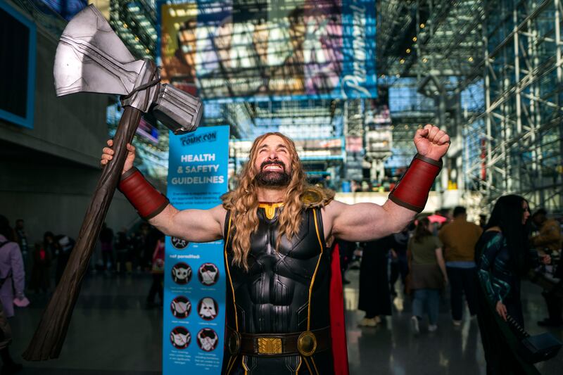 An attendee cosplay as Marvel superhero Thor. AP Photo