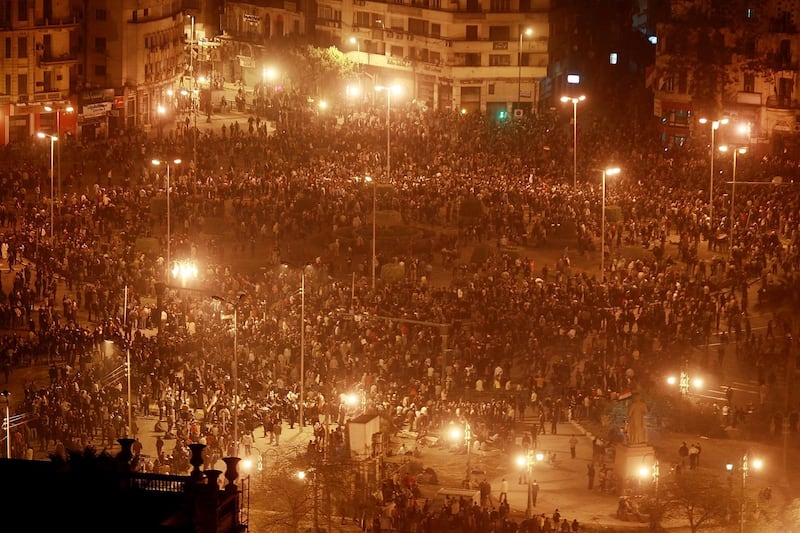 CAIRO, EGYPT - JANUARY 28: Thousands of protestors gather in Tahrir Square despite a curfew on January 28, 2011 in Cairo, Egypt.Thousands of police are on the streets of the capital. Hundreds of arrests have been made in an attempt to quell demonstrations.  (Photo by Peter Macdiarmid/Getty Images)