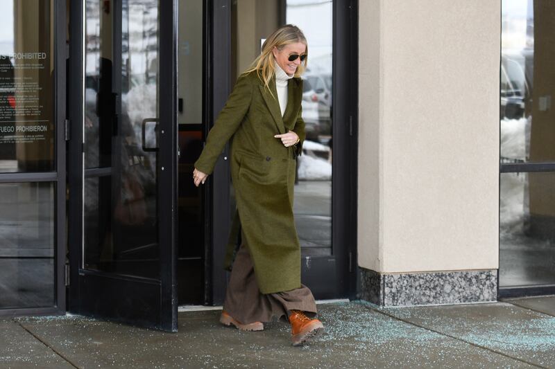 Gwyneth Paltrow wore an olive coat and oatmeal turtleneck jumper from The Row, with oversized trousers, Celine boots and Ray-Ban Aviators to attend court on the first day of the lawsuit in Park City, Utah on March 21. AP Photo