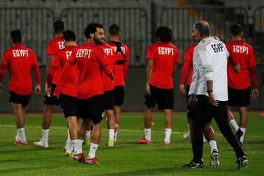 Soccer Football - World Cup - Africa Qualifiers - Egypt Training - Borg El Arab Stadium, Alexandria, Egypt - October 7, 2021 Egypt's Mohamed Salah and Egypt coach Carlos Queiroz during training REUTERS / Amr Abdallah Dalsh