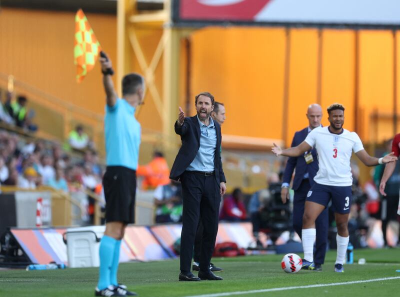 England manager Gareth Southgate and full-back Reece James complain to the linesman. Reuters