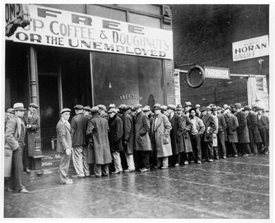 Unemployed people queue outside a restaurant in the US in the 1930s. Photo: US Holocaust Memorial Museum