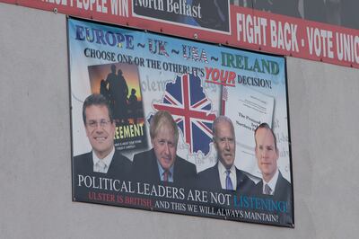 A pro-British poster against the Northern Ireland Protocol is seen in the Protestant Shankill Road area of west Belfast. Photo: Paul McErlane