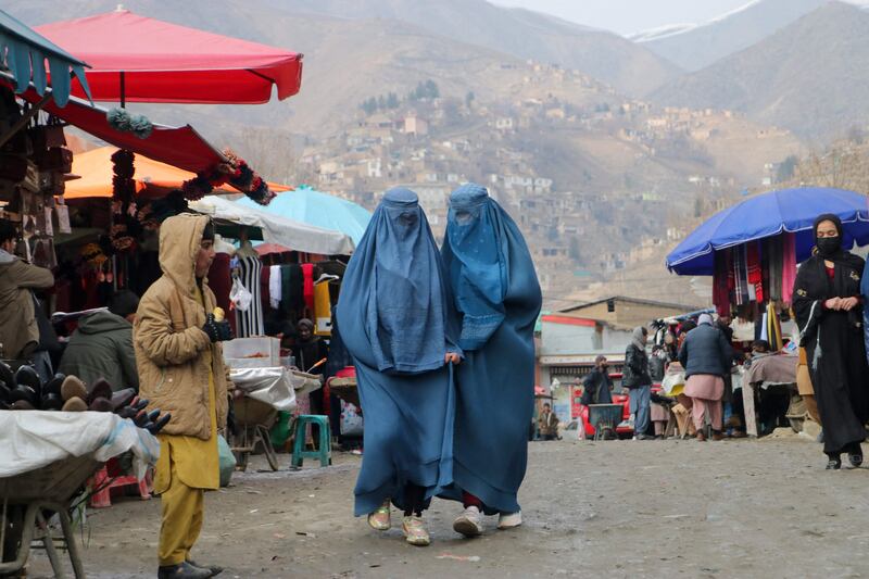 Afghan women at a market in the Fayzabad district of Badakhshan province on January 23. AFP