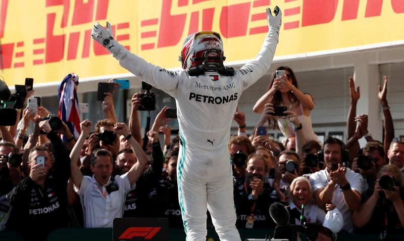 Hamilton salutes his Mercedes team. Reuters